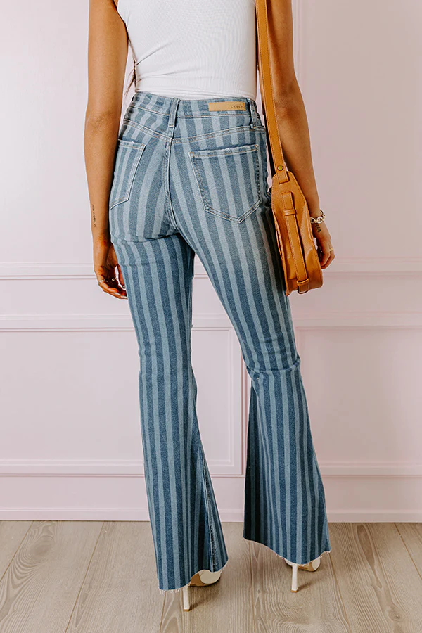 The Coston High Waist Distressed Flare in Medium Wash - Image 3