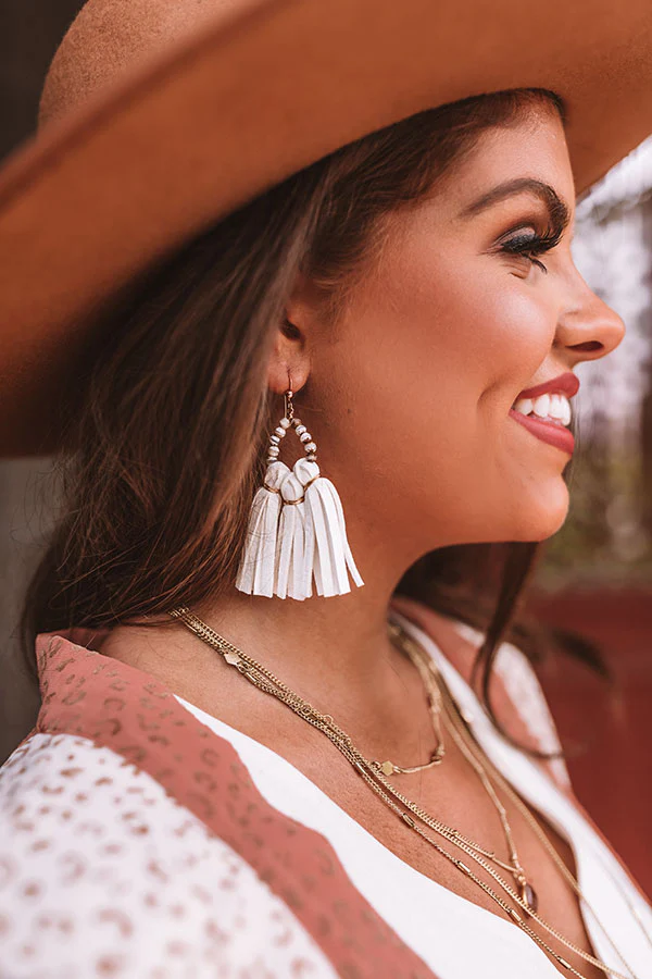 The Penelope Mini Tassel Earrings in White - Image 2
